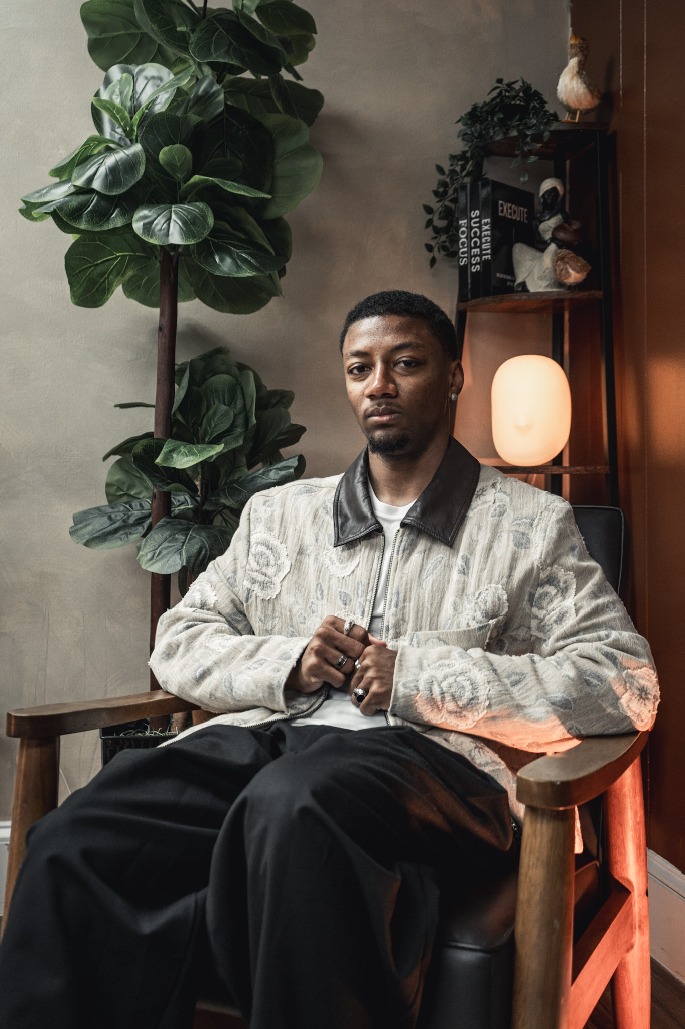 Evan J — host of MentalGame, seated in studio